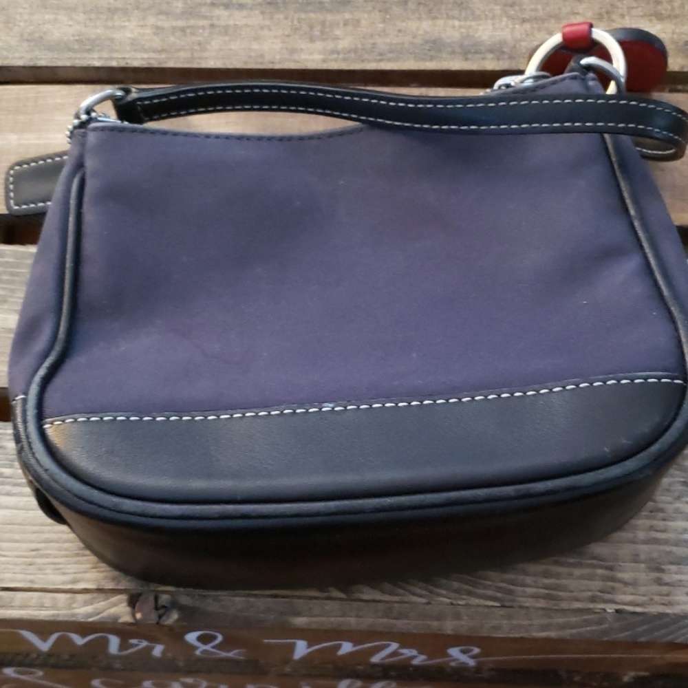 Small dark brown coach bag with key chain